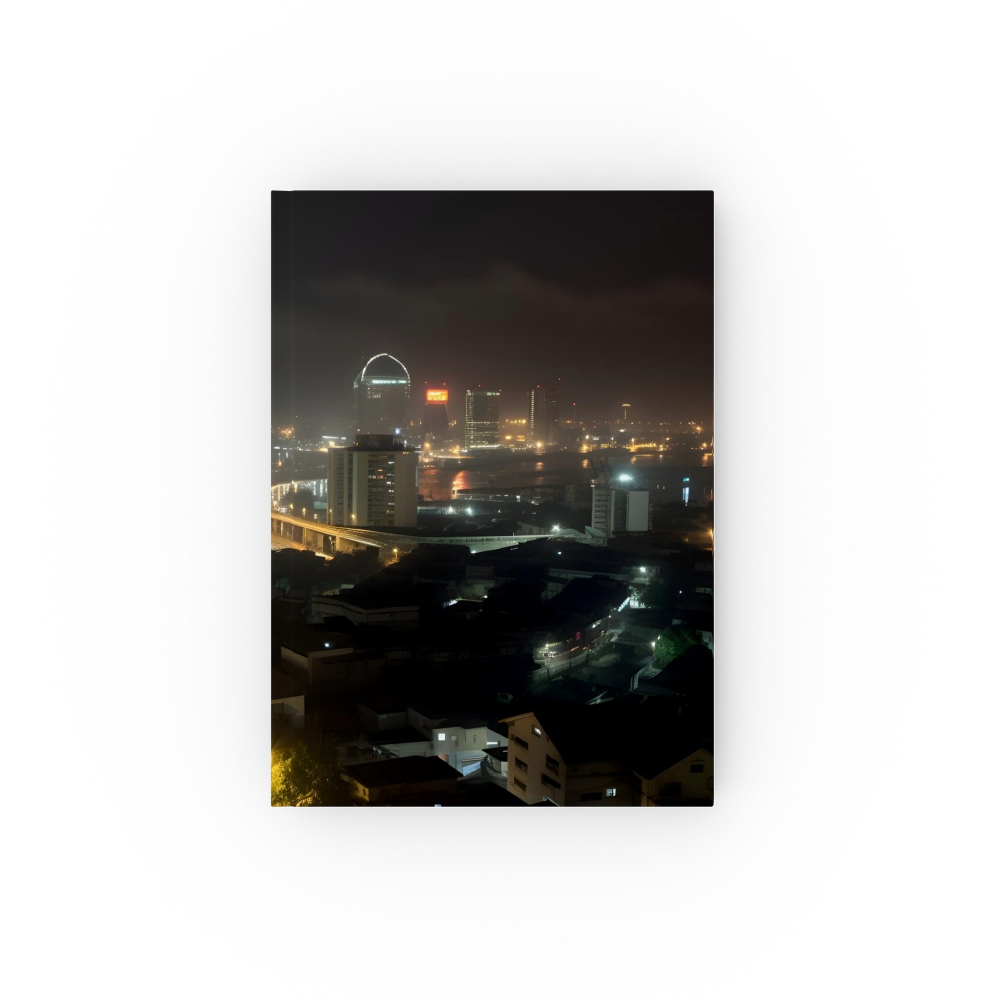 "Capture the vibrant energy of Lagos at night with this stylish and versatile journal. Perfect for city adventures and Nigerian culture reflections. Makes a great gift! Shop now."