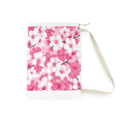 "Cherry Blossom Laundry Bag - Elegant pink and white pattern for stylish laundry carrying"