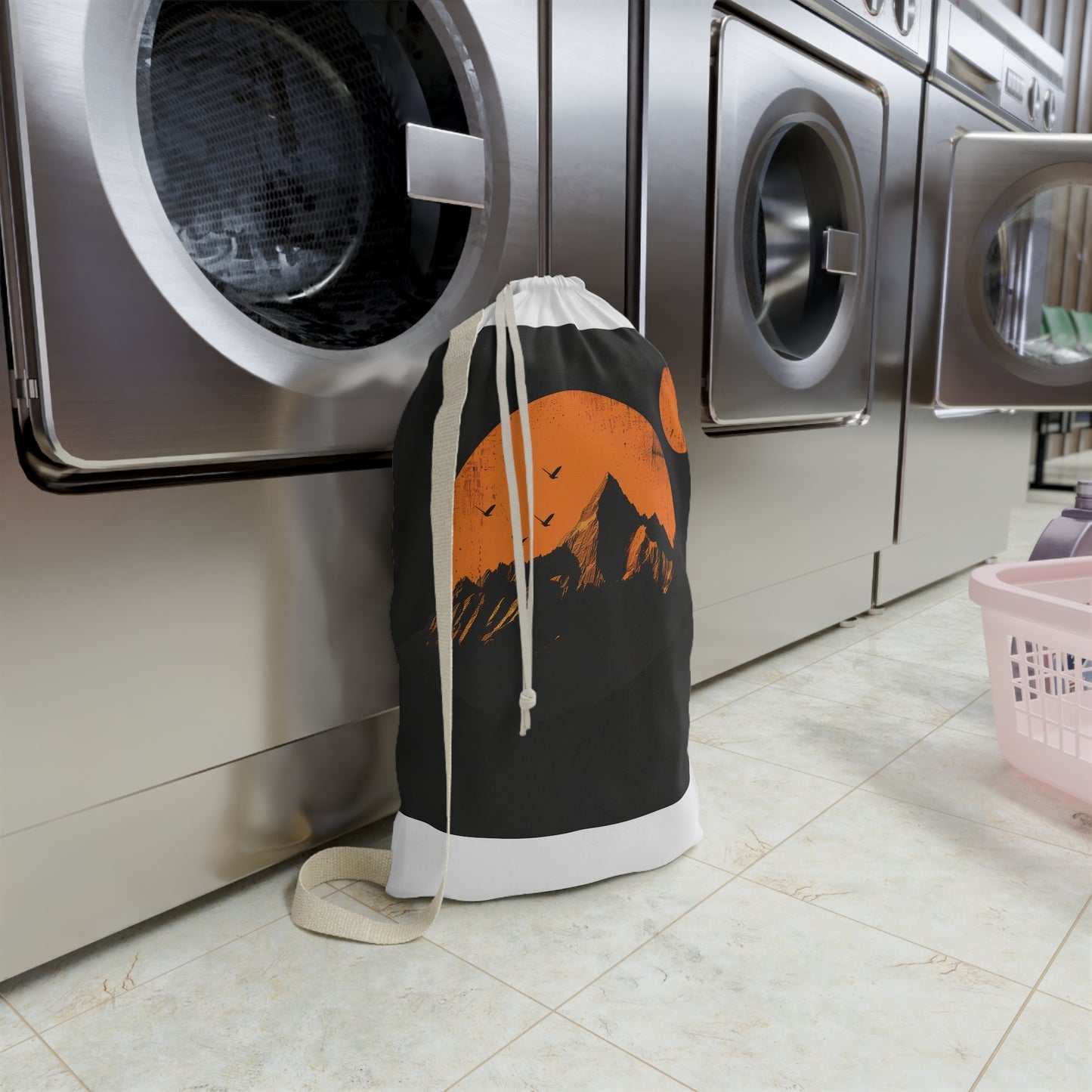 "Sunrise Mountain Range Laundry Bag - Elevate laundry with stylish minimalist design featuring rising sun, perfect for organization"