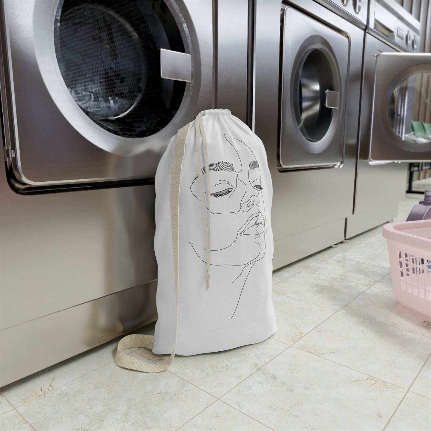 "Minimalist abstract face laundry bag for modern home decor organization"