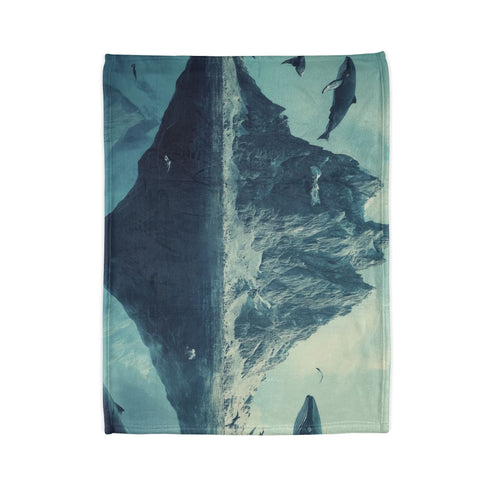 Floating Mountain Surrounded by Whales — Plush Fleece Throw Blanket — Folded Plush Blanket Detail