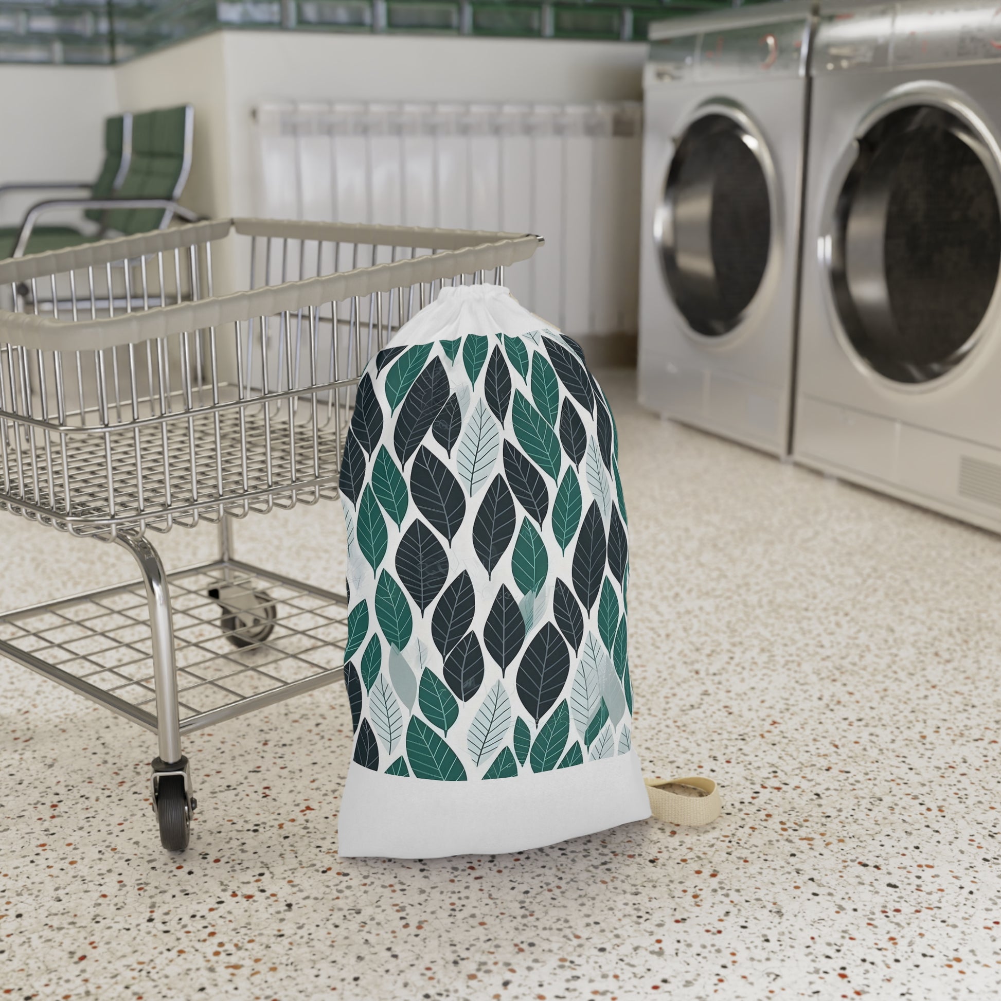 "Green leaf pattern laundry bag with durable ferret texture, stylish and practical"