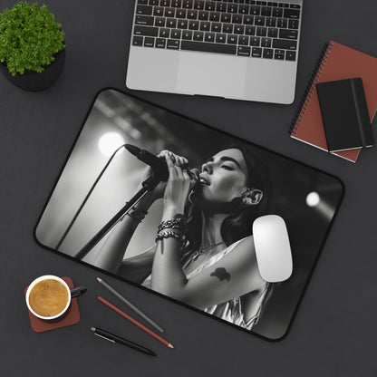 "Dua Lipa Desk Mat Collection featuring pop star singing on stage: Stay inspired and organized at work!"