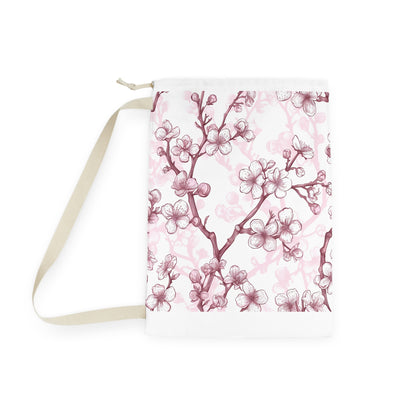 Soft pink and white Cherry Blossom laundry bag, elevate your routine with this stylish and seamless patterned bag.