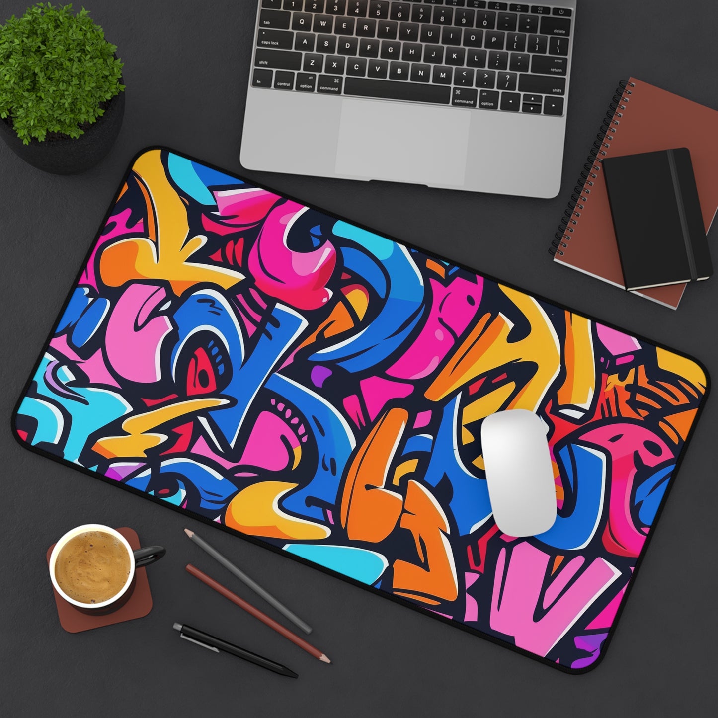 "Neon graffiti desk mat with vibrant urban pattern for stylish workspace organization"