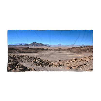 making it ideal for lounging on the sand or drying off after a swim. The bold design will make you stand out on any beach or poolside. Get ready to explore the Atacama Desert with this eye-catching beach towel!