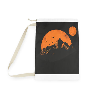 "Sunrise Mountain Range Laundry Bag - Minimalist laundry bag with rising sun design, keeps clothes organized and stylish"