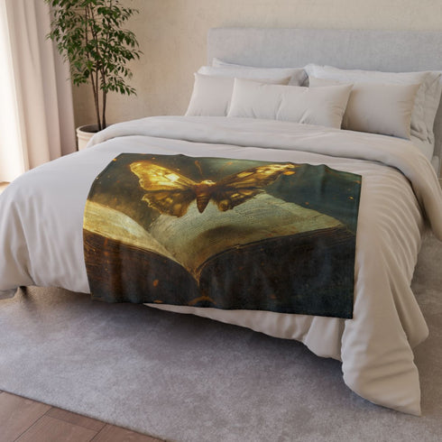 Celestial Moth Hovering Over Ancient Tomb — Plush Fleece Throw Blanket — Draped Over Sofa & Bed Lifestyle View