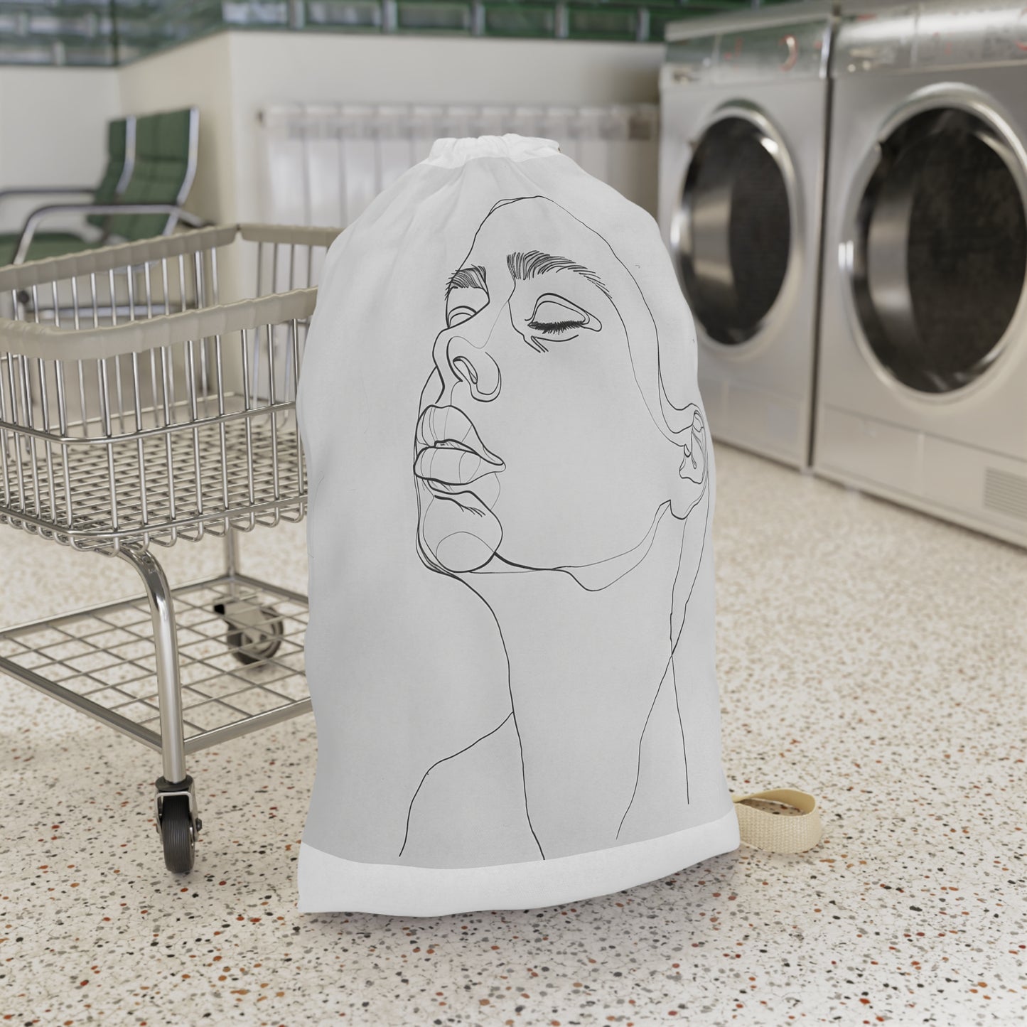 "Minimalist face laundry bag in chic design for modern homes - durable material"