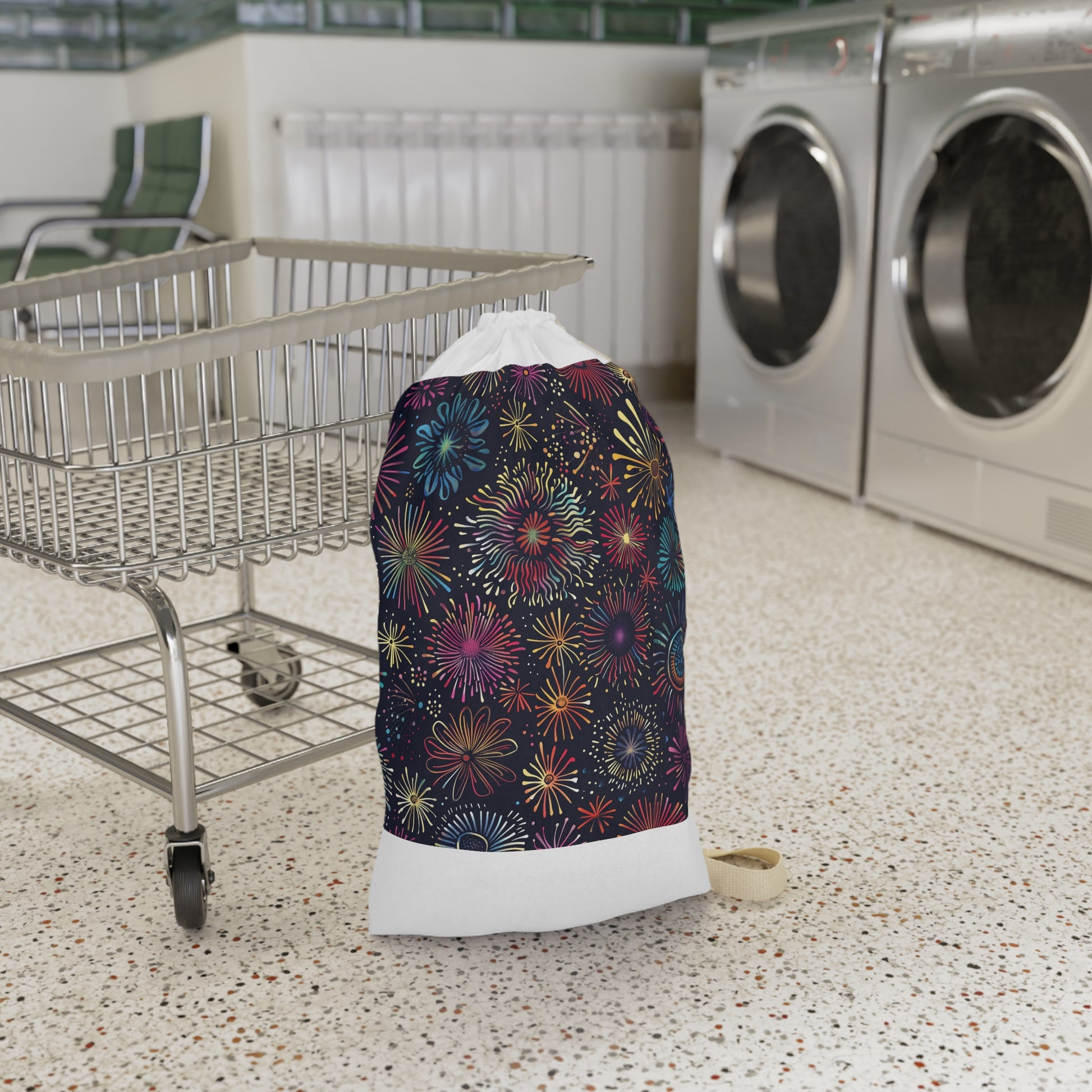 "Colorful festive fireworks patterned laundry bag - stylish and durable for laundry day fun"