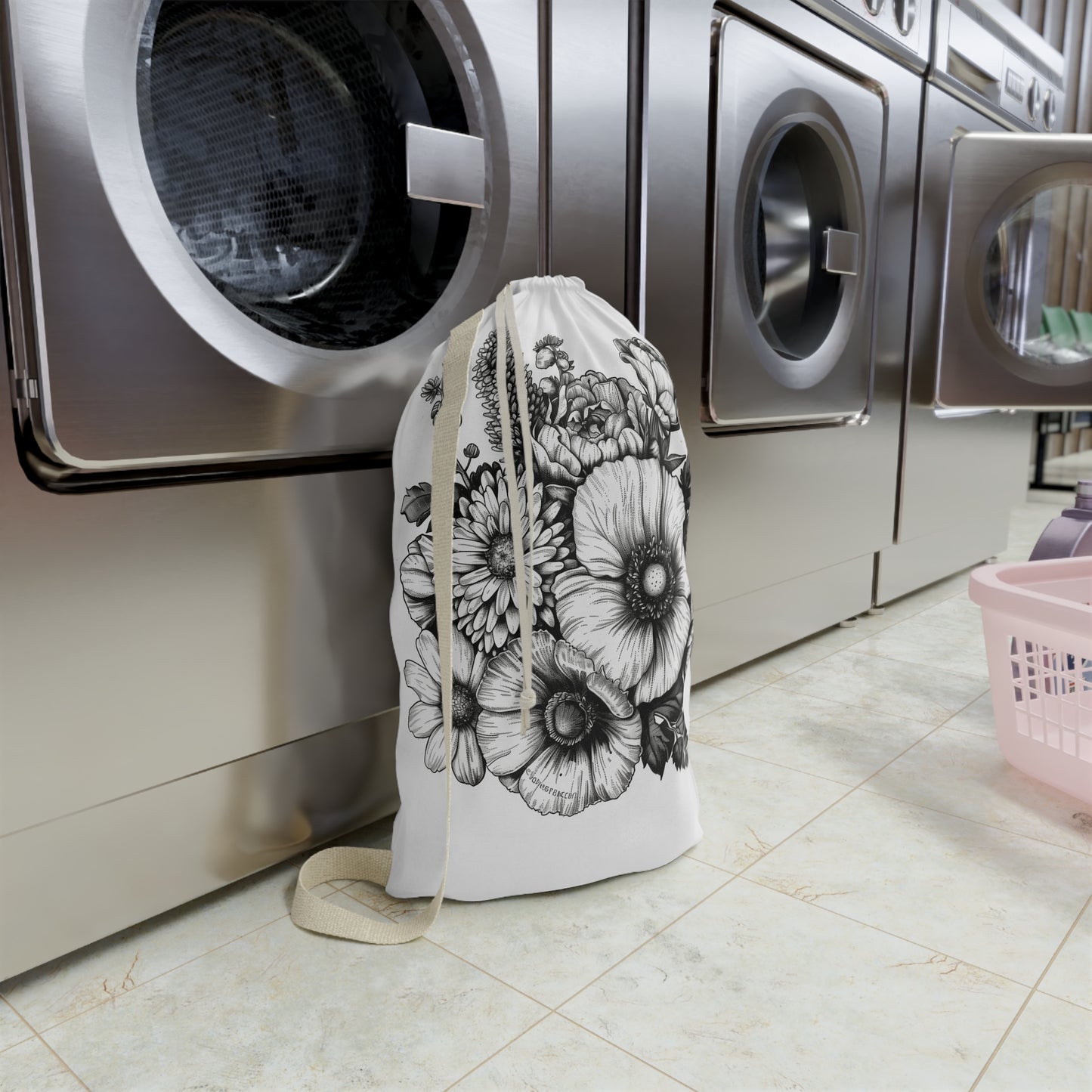 "Floral hand-drawn laundry bag for stylish organization on laundry day"