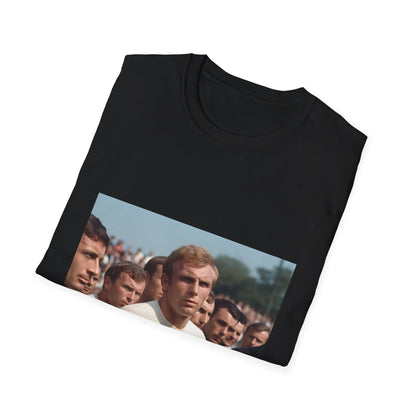 Image of A Captain's Legacy: The Spirit of '66 T-shirt, honoring England's legendary captain Bobby Moore from the 1966 World Cup triumph. Feel the roar of the crowd and the weight of national pride with this timeless design. Carry a piece of footballing history close to your heart.