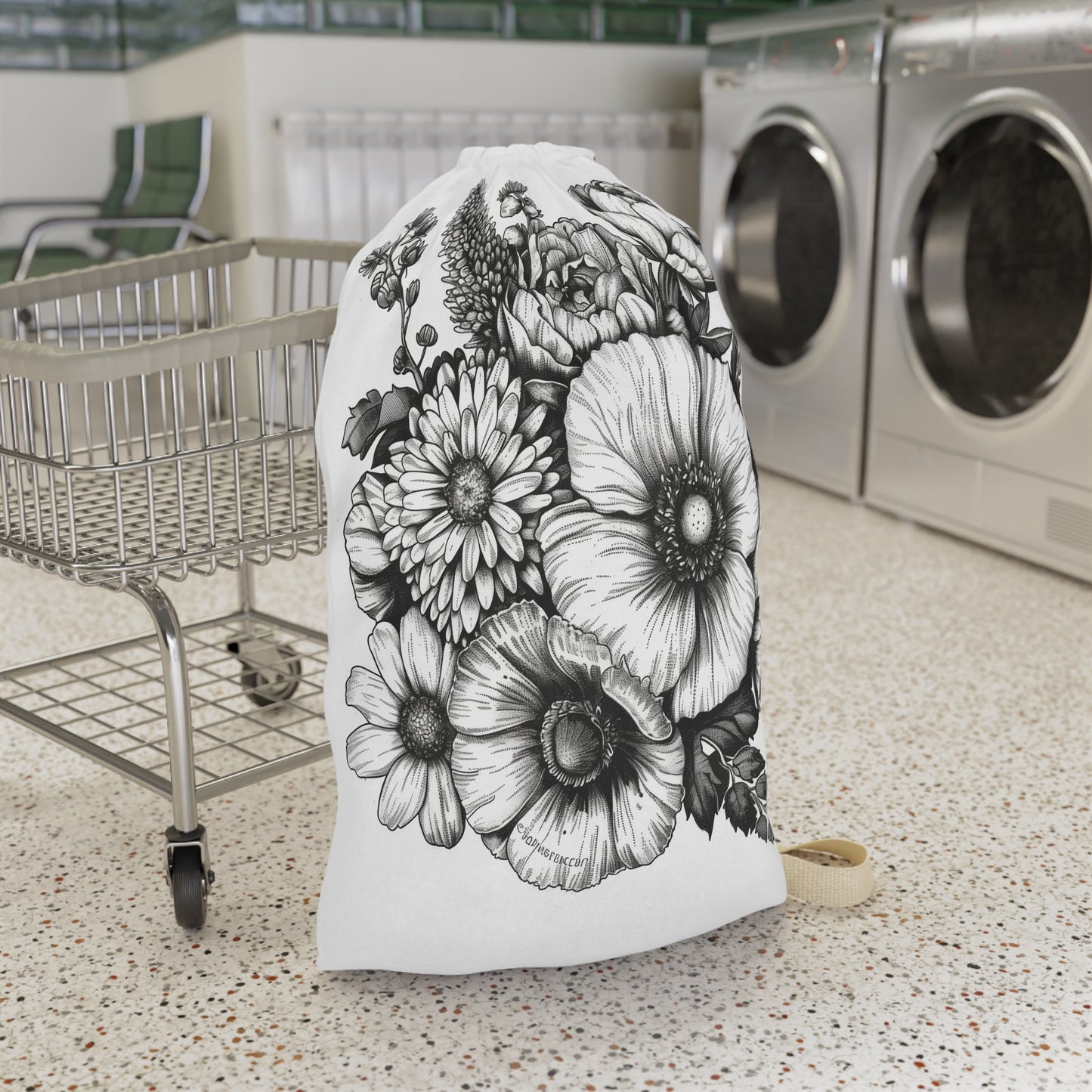 "Floral hand-drawn laundry bag - keep laundry organized and space stylish"