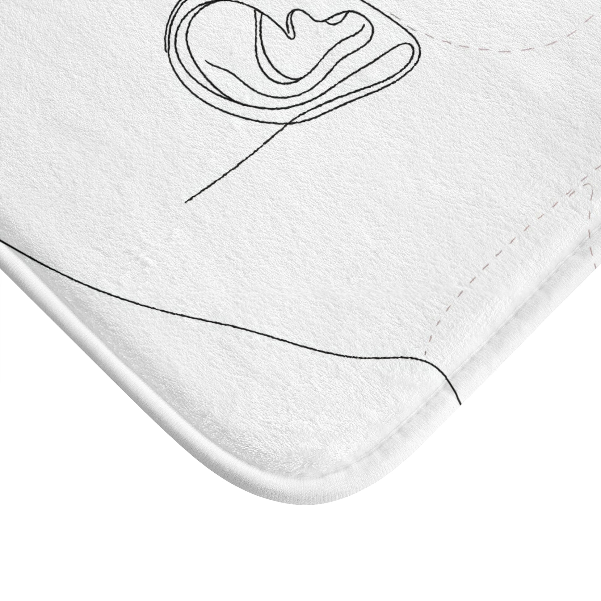 Alt text: Abstract Face Bath Mat - Minimalist chic bath mat with line art representation of a face. High-quality material, comfortable, and stylish. Size: 24" × 17". Perfect for all seasons. Makes a great gift. Shop more at printswithpassion.com.