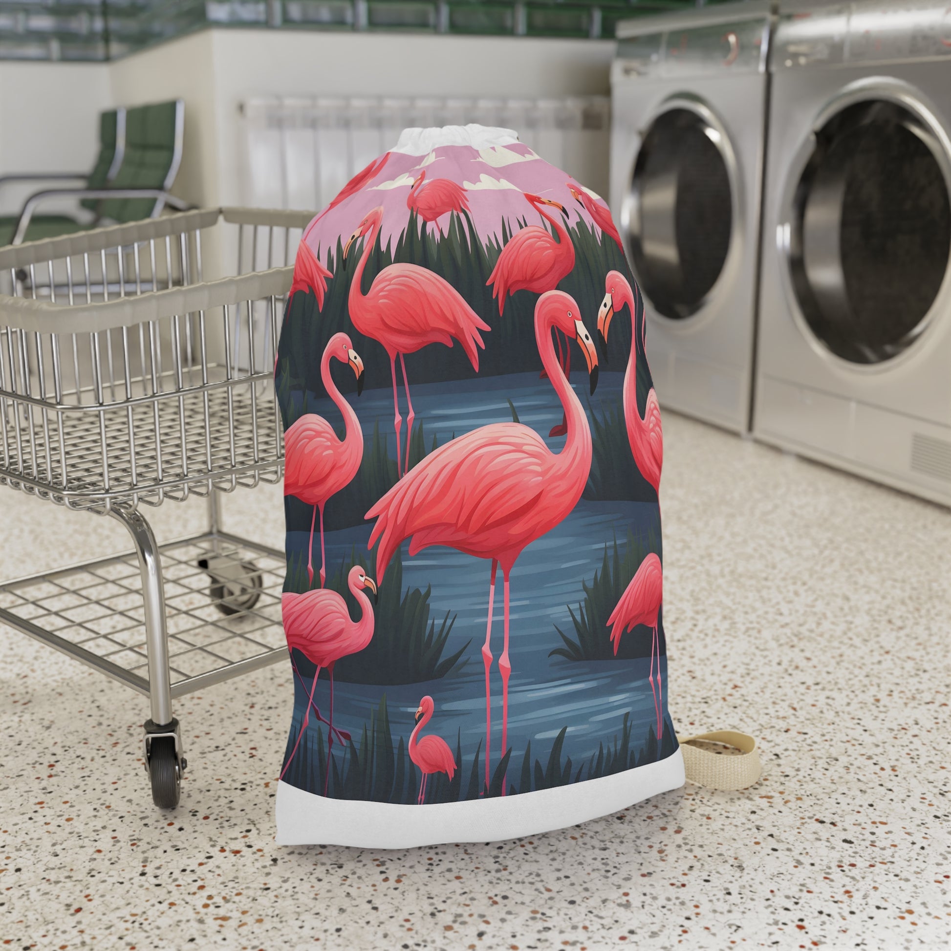 "Flamingo Fiesta Laundry Bag - Fun and vibrant pink flamingo pattern for a pop of personality in your space."