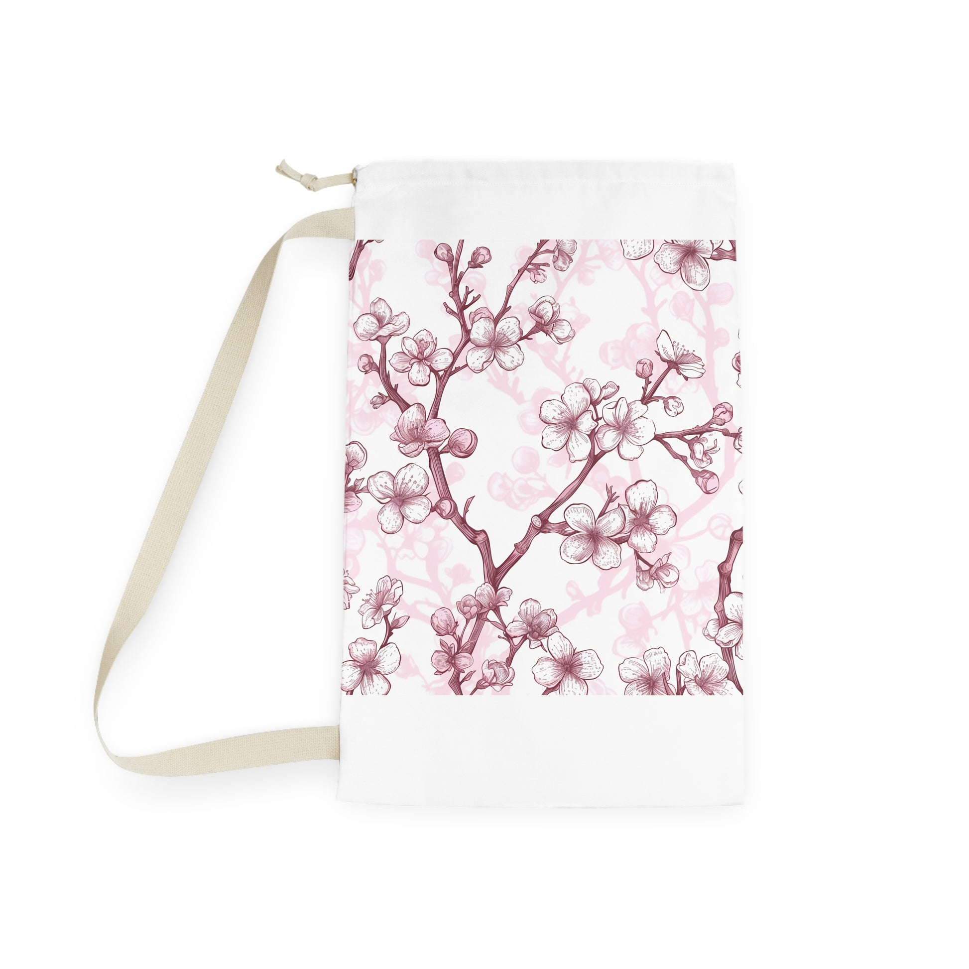 Soft pink and white Cherry Blossom laundry bag, stylishly contains dirty laundry with seamless floral pattern. Elevate your routine.