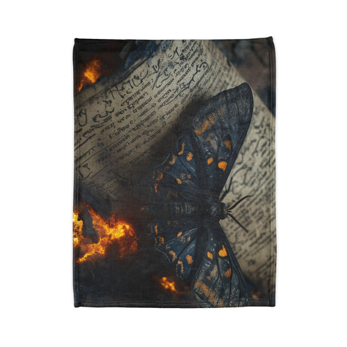 Lava Moth Resting on Burning Scroll — Plush Fleece Throw Blanket — Folded Plush Blanket Detail