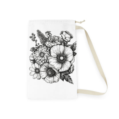 "Floral hand-drawn laundry bag with stylish design for organized laundry day"