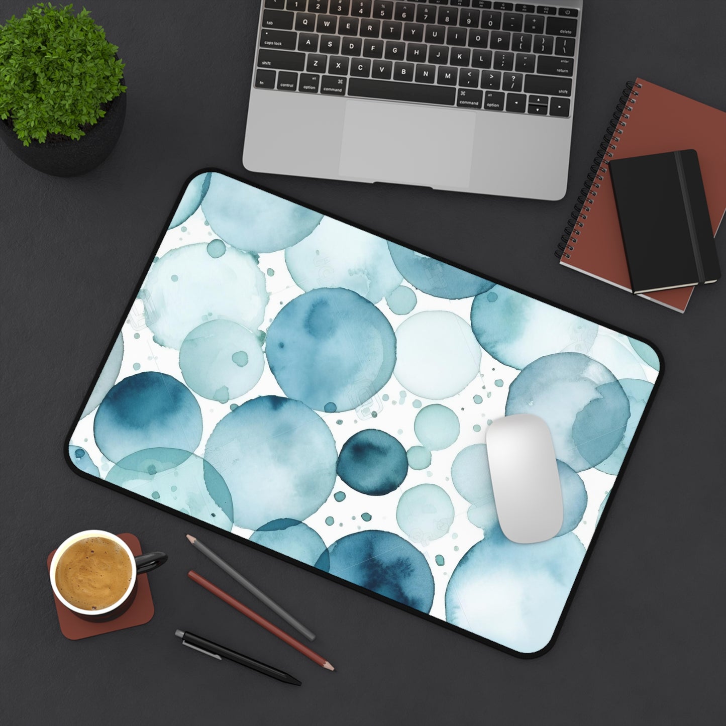 "EyeTide Desk Mat - Mesmerizing eyes pattern in cool blue water color, perfect for spicing up your workspace."