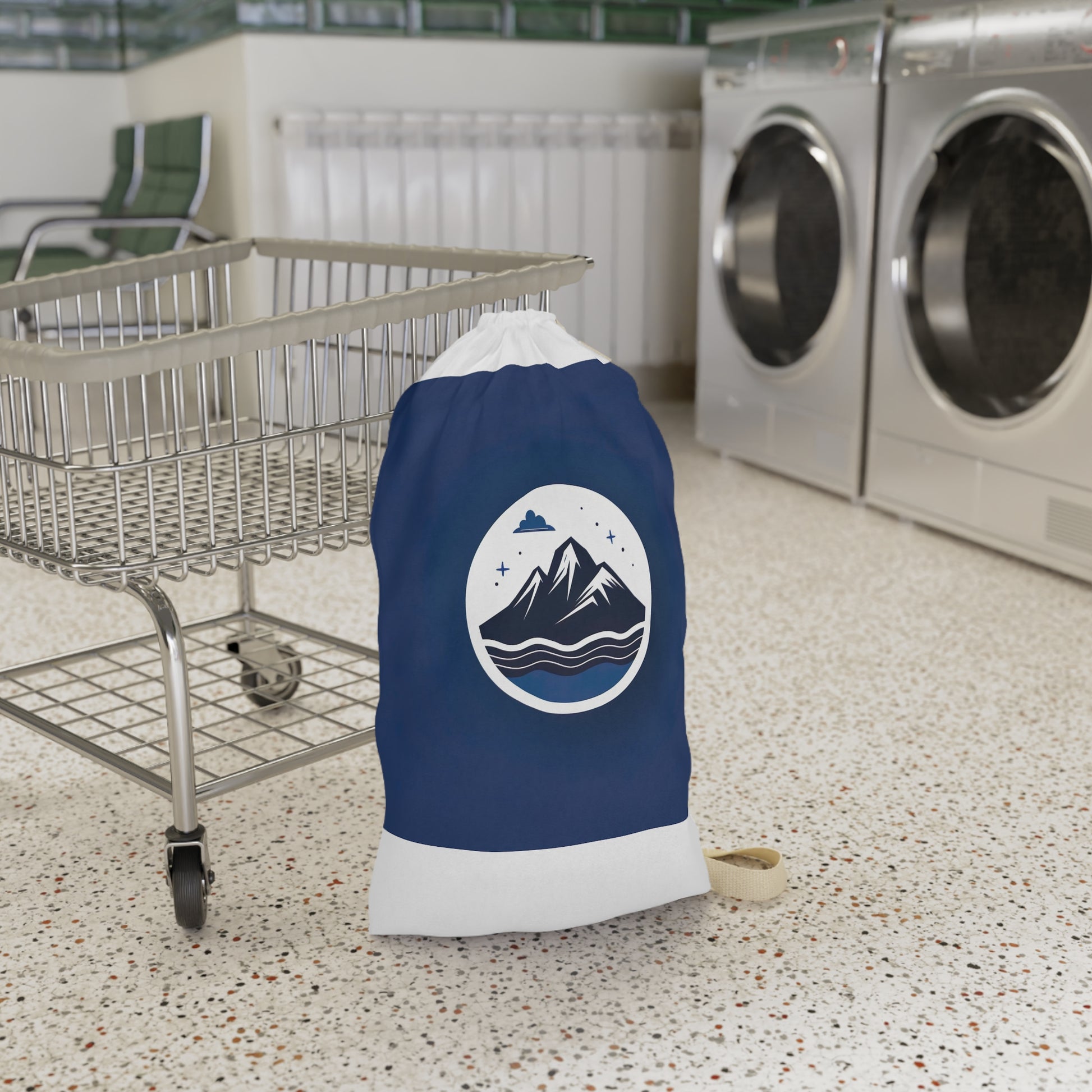 "Mountains logo laundry bag, durable material with drawstring closure for stylish transport. #laundrybag #mountainlogo"