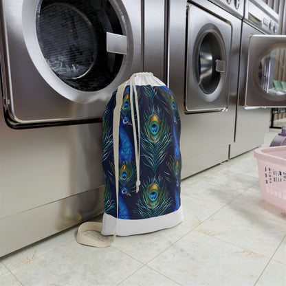 "Peacock Blue Laundry Bag with Feather Design - Stylish transport for your laundry routine"