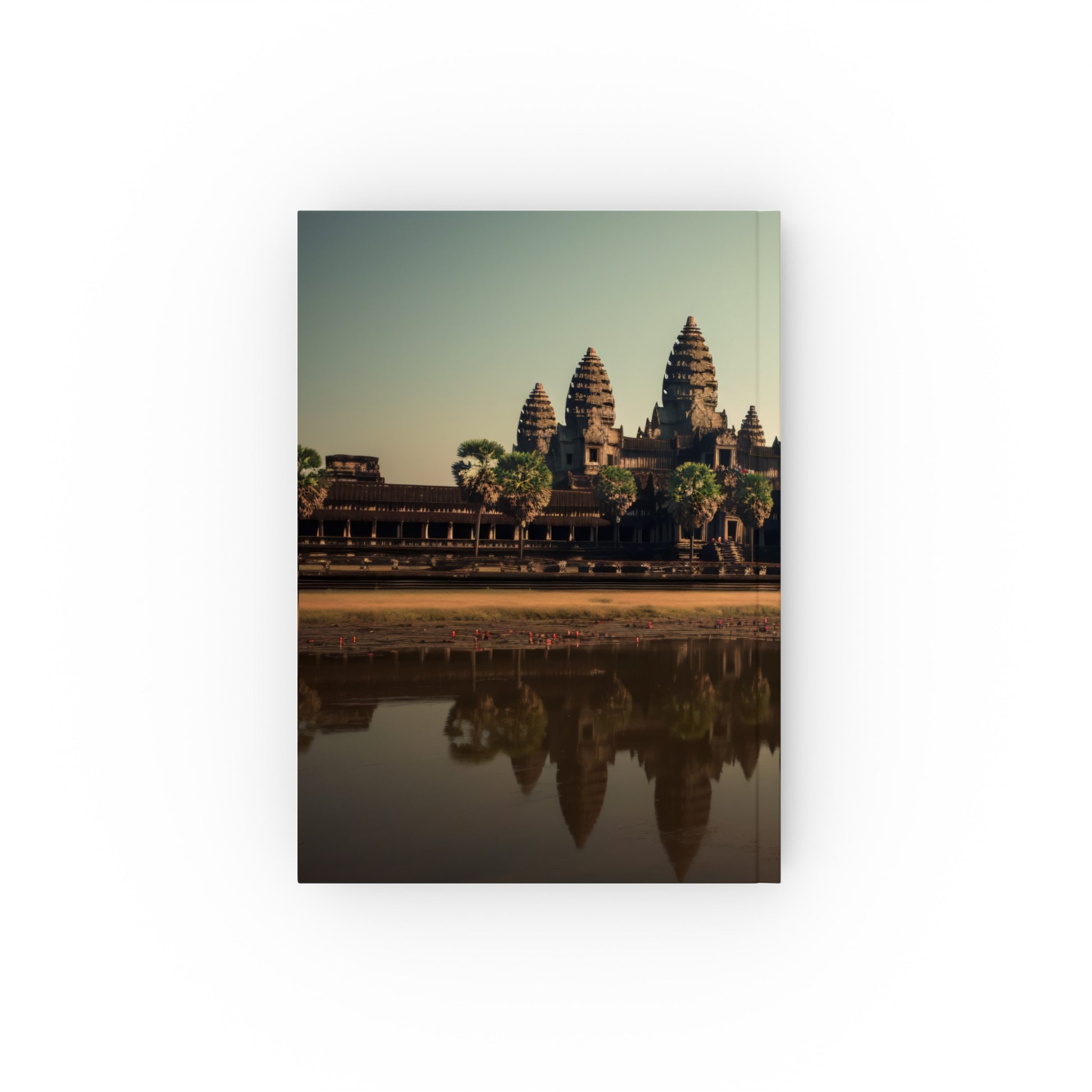 "Explore Angkor Wat Reflections Traveler's Journal - Perfect gift for all seasons, featuring majestic towers of Angkor Wat at dawn. High-quality and stylish design."