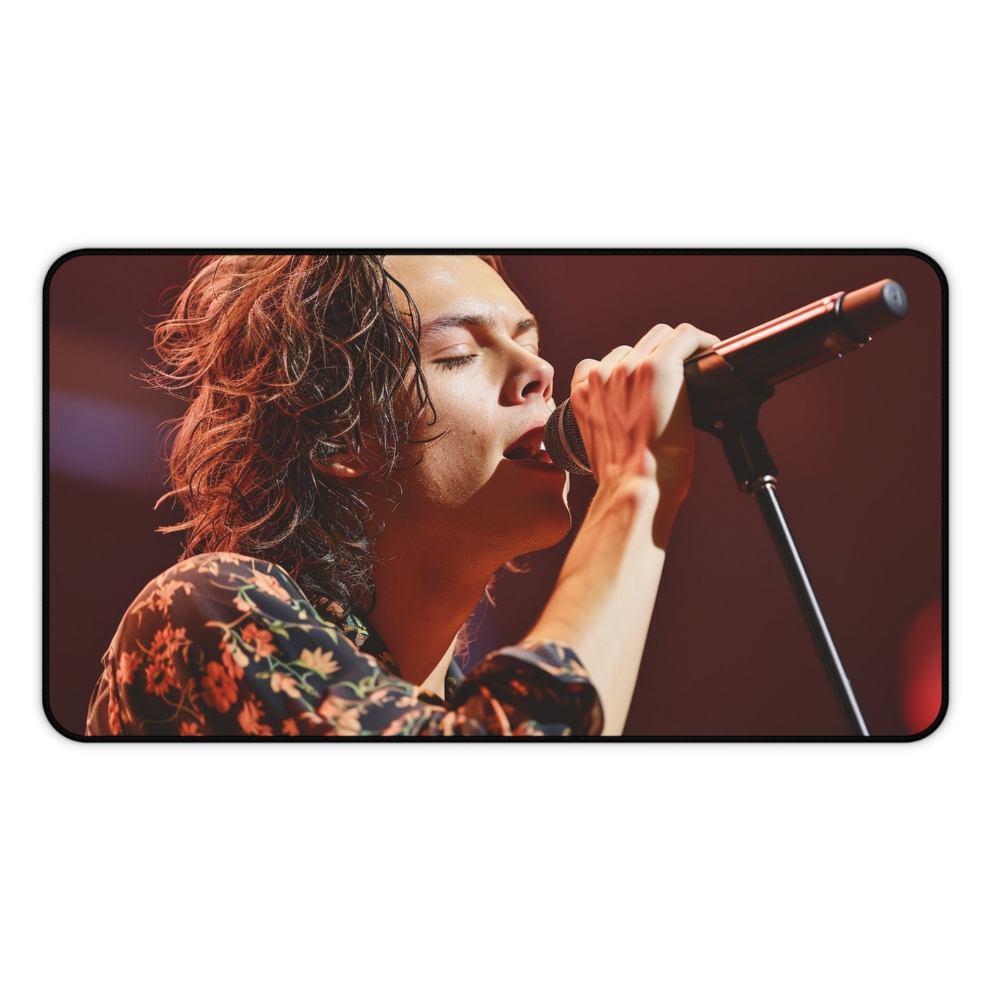 "Harry Styles singing desk mat brings concert energy to workspace with vibrant illustration, surf on music wave"