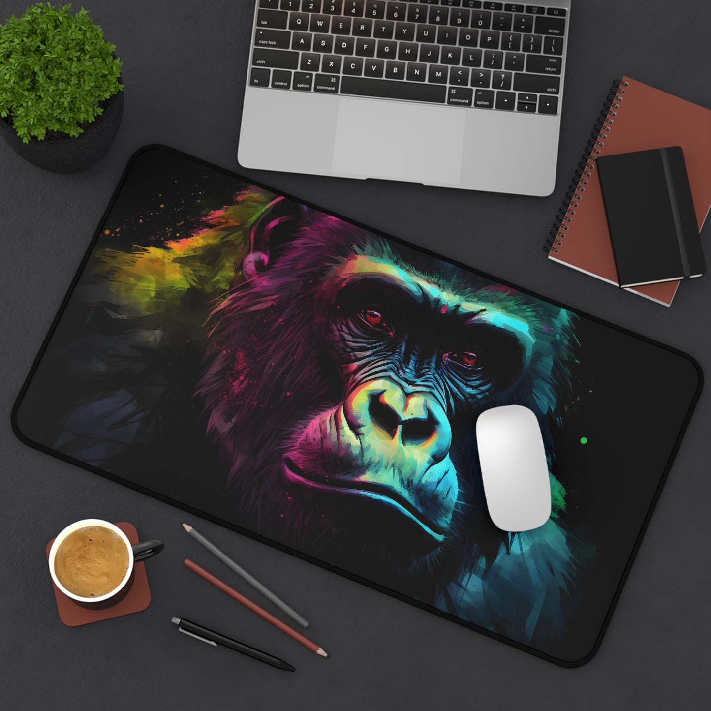 "Neon Gorilla Desk Mat brightens up workspace with watercolor design, keeps desk organized and protected"