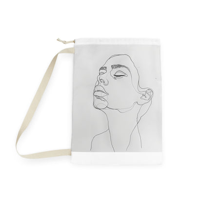 Minimalist line art face laundry bag, chic addition to laundry routine, durable material, sleek design.