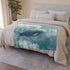 Glass Fish Swimming Through Clouds — 50×60 Plush Throw Blanket — Draped Over Sofa & Bed Lifestyle View