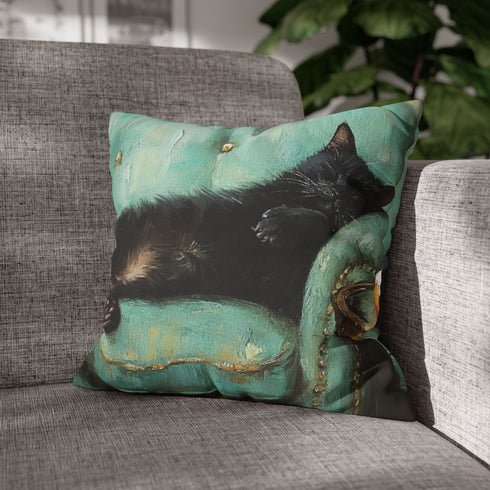 Keiska Black Cat Sleeping Stretched Out on a Teal Vinta — 40×40 Cushion Cover — Sofa & Armchair Living Room Lifestyle View
