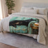 Keiska Black Cat Sleeping Stretched Out on a Teal Vinta — 50×60 Plush Throw Blanket — Draped Over Sofa & Bed Lifestyle View