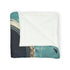 Music Floating from Cracked Speaker Planet — 50×60 Plush Throw Blanket — Draped Over Sofa & Bed Lifestyle View