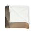 Tesseract Floating in Desert Storm — 50×60 Plush Throw Blanket — Draped Over Sofa & Bed Lifestyle View