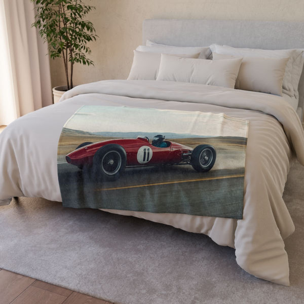 Vintage Race Car Speeding on a Desert Highway — 50×60 Plush Throw Blanket — Draped Over Sofa & Bed Lifestyle View