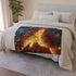 Volcano Erupting into Music Notes (Edition II) — 50×60 Plush Throw Blanket — Draped Over Sofa & Bed Lifestyle View