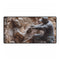 Warrior Carving Time into Rock Wall — XL & XXL Desk Mat — Full Top-Down Artwork View